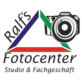 Dreieck mit Kamera und Beschriftung Ralf´s Fotocenter